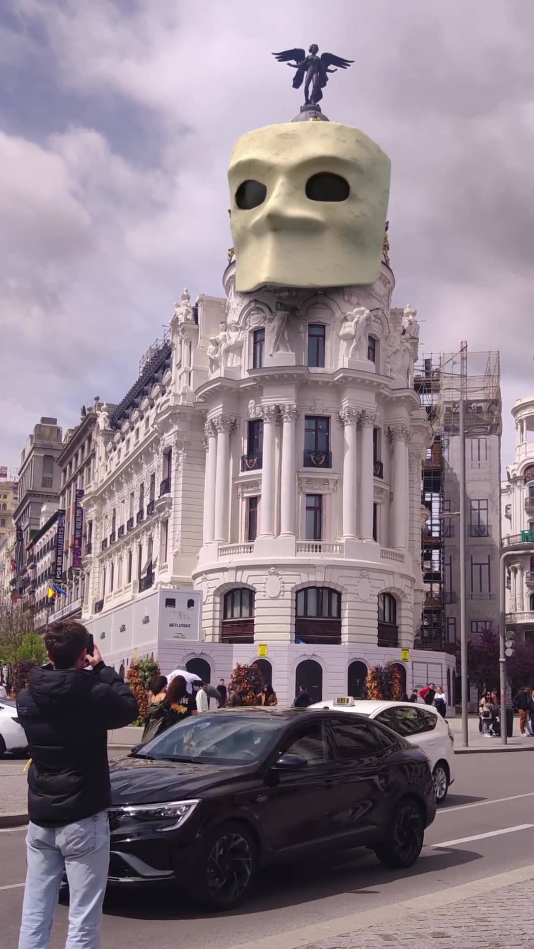 Giant Escape City Box mask placed on top of a city building